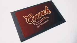 CRUNCH by Kelvin Chad Unterschriebene Münze wandert visuell in geliehene Snacktüte